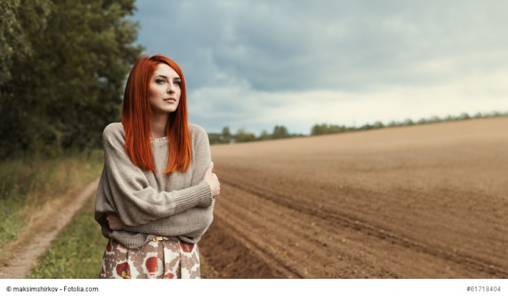 Beautiful sensual girl in a lonely field